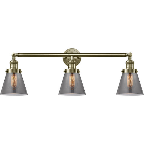Franklin Restoration Small Cone 3 Light 30 inch Antique Brass Bath Vanity Light Wall Light in Incandescent, Plated Smoke Glass, Franklin Restoration