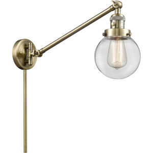 Beacon 21 inch 60.00 watt Antique Brass Swing Arm Wall Light, Franklin Restoration