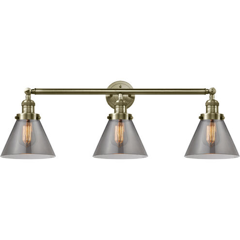 Franklin Restoration Large Cone 3 Light 32 inch Antique Brass Bath Vanity Light Wall Light in Incandescent, Plated Smoke Glass, Franklin Restoration
